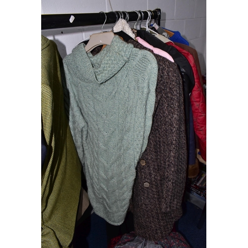 575 - A RAIL AND TWO BOXES OF LADIES CLOTHING, to include coats, jackets, faux furs, sheepskins, skirts an... 