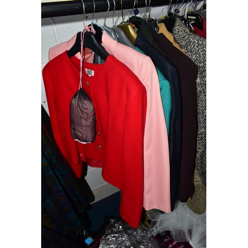 575 - A RAIL AND TWO BOXES OF LADIES CLOTHING, to include coats, jackets, faux furs, sheepskins, skirts an... 