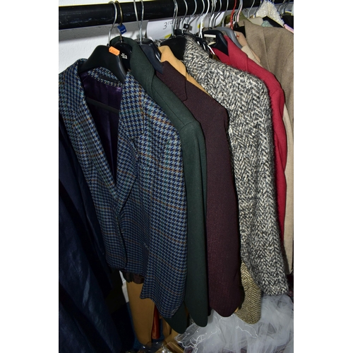 575 - A RAIL AND TWO BOXES OF LADIES CLOTHING, to include coats, jackets, faux furs, sheepskins, skirts an... 