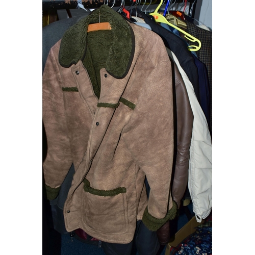 576 - ONE RAIL OF GENTLEMEN'S CLOTHING, to include suits, tweed jackets, sheepskin coat, sweaters, dinner ... 