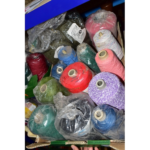579 - FIVE BOXES AND LOOSE KNITTING WOOL ETC, to include unused reels of knitting machine wool, unused bal... 