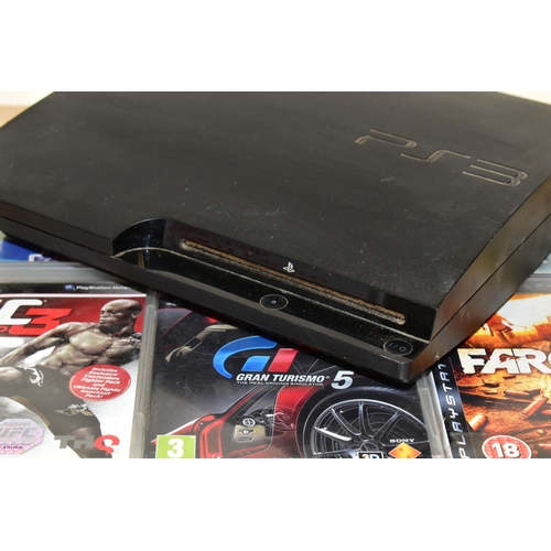 255 - PLAYSTATION 3 CONSOLE AND GAMES, games include Gran Turismo 5, Far Cry 2, Turok, Killzone 3, UFC Und... 