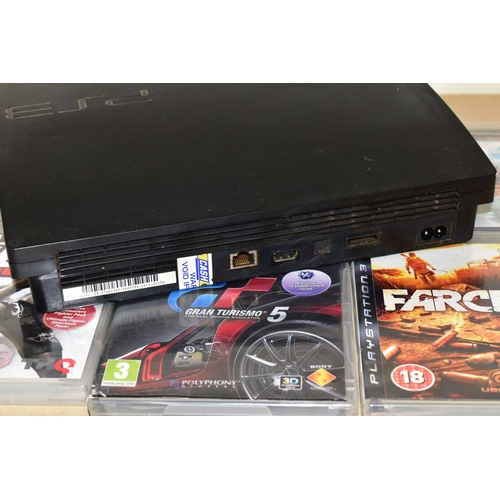 255 - PLAYSTATION 3 CONSOLE AND GAMES, games include Gran Turismo 5, Far Cry 2, Turok, Killzone 3, UFC Und... 