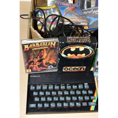 262 - THREE ZX SPECTRUM COMPUTERS AND A QUANTITY OF AMIGA GAMES, games include Wizball, The New Zealand St... 