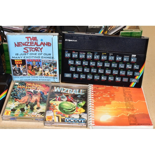 262 - THREE ZX SPECTRUM COMPUTERS AND A QUANTITY OF AMIGA GAMES, games include Wizball, The New Zealand St... 