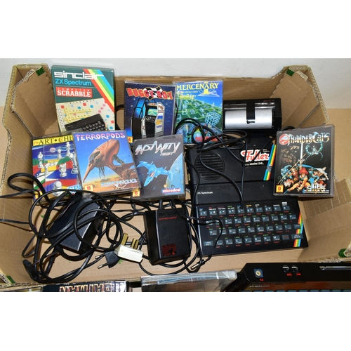 262 - THREE ZX SPECTRUM COMPUTERS AND A QUANTITY OF AMIGA GAMES, games include Wizball, The New Zealand St... 