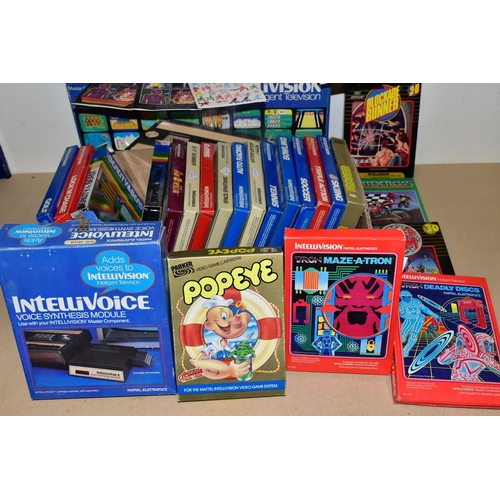 264 - MATEL INTELLIVISION BOXED WITH QUANTITY OF GAMES AND INTELLIVOICE VOICE SYNTHESIS MODULE, games incl... 