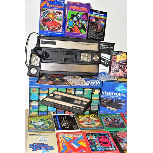 264 - MATEL INTELLIVISION BOXED WITH QUANTITY OF GAMES AND INTELLIVOICE VOICE SYNTHESIS MODULE, games incl... 