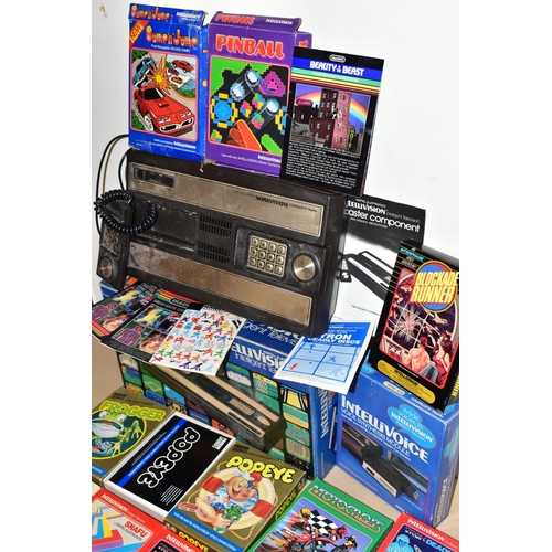 264 - MATEL INTELLIVISION BOXED WITH QUANTITY OF GAMES AND INTELLIVOICE VOICE SYNTHESIS MODULE, games incl... 