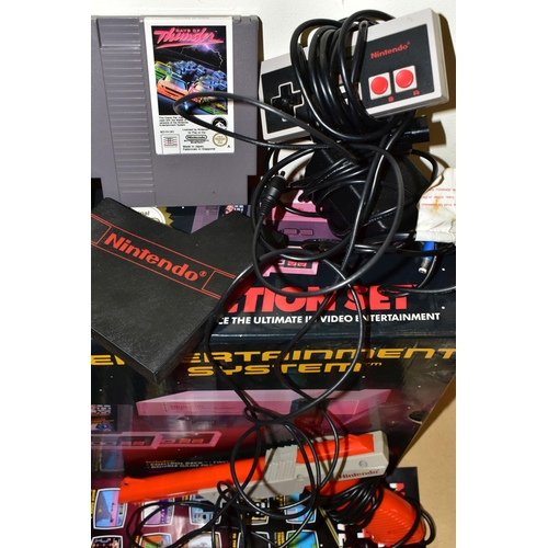 265 - NES BOX, ACCESSORIES AND GAMES, includes the box for the NES (no console), two controllers, the NES ... 