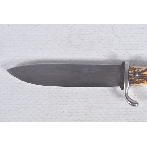 262 - A GERMAN CARL SCHMIDT SOHN HUNTING STYLE DAGGER, one side of the blade had the makers mark plus Ges ... 