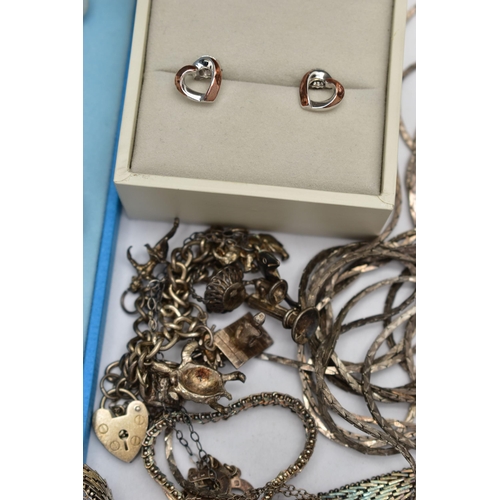 100 - AN ASSORTMENT OF WHITE METAL JEWELLERY, to include a pair of signed 'Fiorelli' open heart earrings s... 