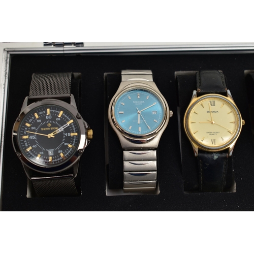 105 - A WATCH DISPLAY BOX WITH WATCHES, six storage case with six gents wristwatches, to include three Sek... 