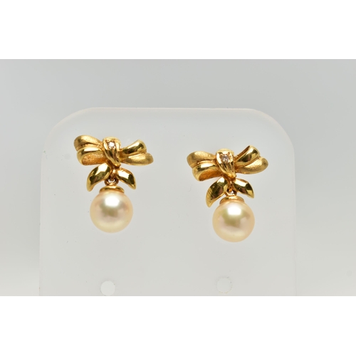 13 - A PAIR OF 18CT GOLD, CULTURED PEARL DROP EARRINGS, each earring designed as a bow set with a small r... 