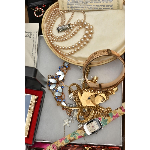 131 - AN ASSORTMENT OF COSTUME JEWELLERY AND WATCHES, to include a 9ct metal core hinged bangle, 'Dmar' im... 