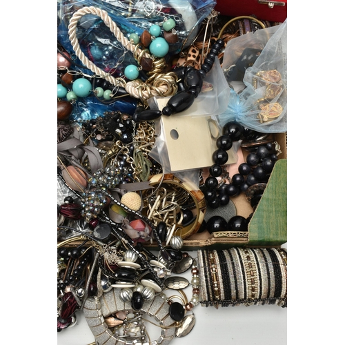 136 - A LARGE ASSORTMENT OF COSTUME JEWELLERY, to include a selection of beaded necklaces, clip on earring... 