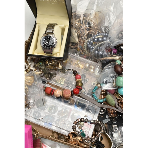 136 - A LARGE ASSORTMENT OF COSTUME JEWELLERY, to include a selection of beaded necklaces, clip on earring... 