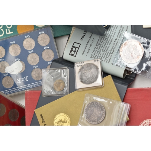 155 - A CARDBOARD BOX CONTAINING COINS AND COMMEMORATIVES, to include a display of six Victoria Crown coin... 