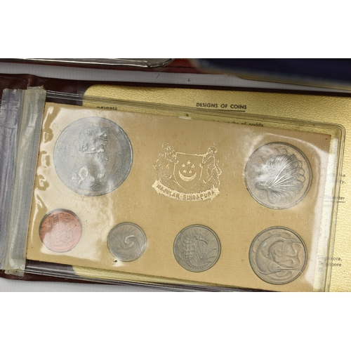 158 - A LARGE BOX CONTAINING WORLD COINAGE, to include several tins with mixed coinage such as Kiribati 19... 