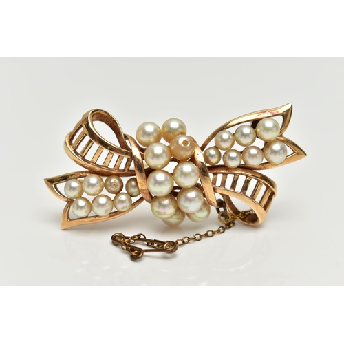 2 - A YELLOW METAL 'MIKIMOTO' CULTURED PEARL BOW BROOCH, openwork bow set with two rows of cultured pear... 