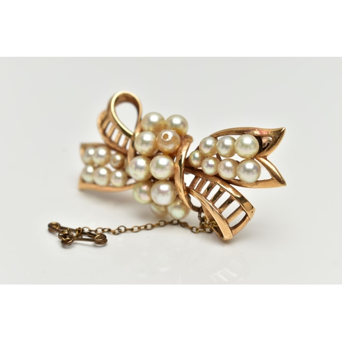 2 - A YELLOW METAL 'MIKIMOTO' CULTURED PEARL BOW BROOCH, openwork bow set with two rows of cultured pear... 