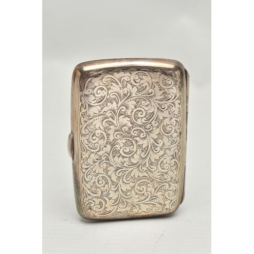 212 - AN EDWARDIAN SILVER CIGARETTE CASE, rounded rectangular form with engraved foliate decoration and mo... 