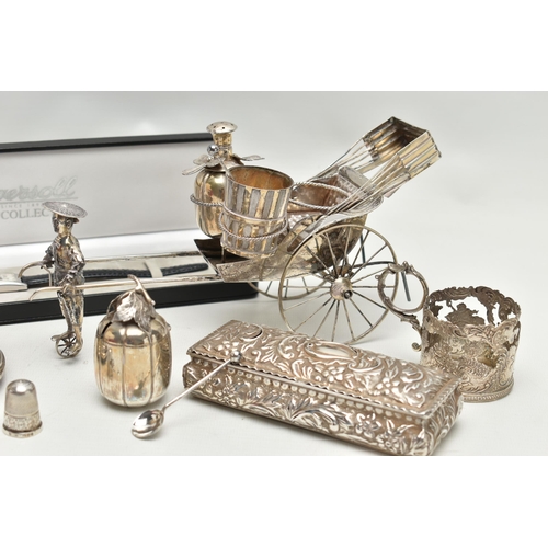 237 - A CHINESE WHITE METAL CRUET SET IN THE FORM OF A RICKSHAW BEING PULLED BY A MAN, the salt of pail fo... 