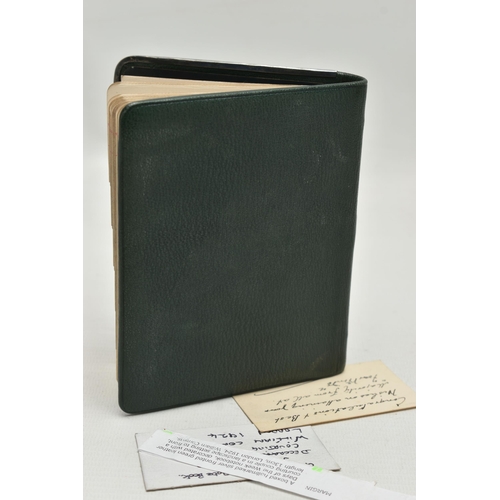 239 - A EDWARDIAN WILLIAM COMYNS & SONS SILVER MOUNTED AND GREEN LEATHER BOUND DAYS OF THE WEEK NOTEBOOK, ... 