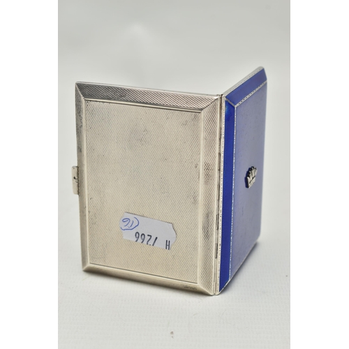 240 - A GEORGE V SILVER AND ENAMELLED CIGARETTE CASE WITH MOUNTED NAVAL CROWN, the engine turned case with... 