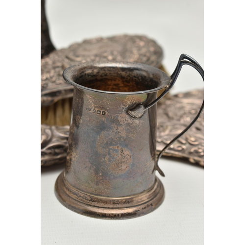 249 - A SMALL PARCEL OF SILVER, comprising an Edwardian silver conical christening mug with scrolled wire ... 