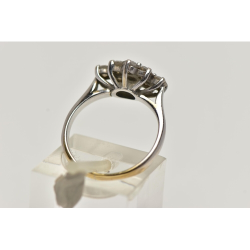 35 - AN 18CT WHITE GOLD DIAMOND CLUSTER RING, of a marquise outline, set with nine round brilliant cut di... 