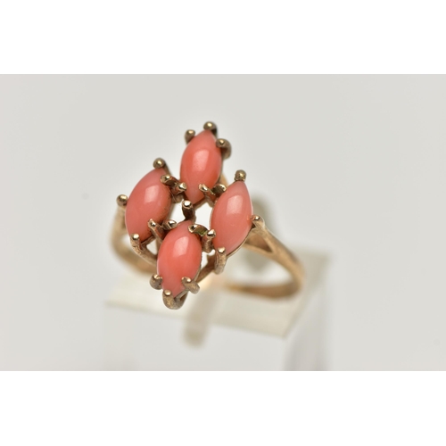 53 - A 9CT GOLD CORAL RING, four marquise cabochon coral stones set as a cluster in a yellow gold mount, ... 