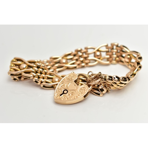 8 - A 15CT YELLOW GOLD, WIDE GATE BRACELET, featuring textured oval links and ball detail, fitted with a... 