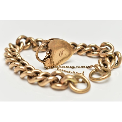 9 - A HEAVY 9CT GOLD CURB LINK BRACELET, large links, hallmarked 9ct London, makers mark 'MFld', fitted ... 