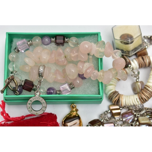 95 - A SMALL BAG OF JEWELLERY AND BEADS, to include a pair of white metal butterfly drop earrings, with f... 