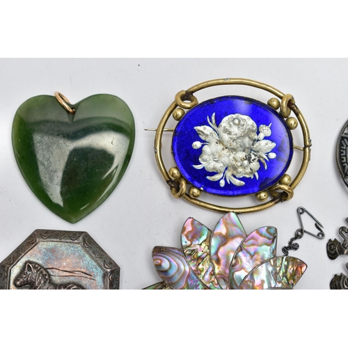 98 - AN ASSORTMENT OF PENDANTS AND BROOCHES, the first a heart shaped nephrite jade pendant, fitted with ... 