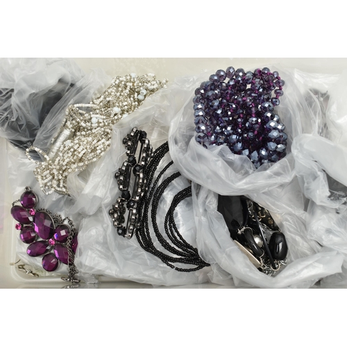 114 - A LARGE ASSORTMENT OF COSTUME JEWELLERY, to include a 'Betsey Johnson' necklace, a 'Mikey' snake nec... 