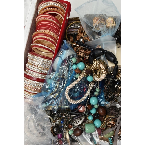 136 - A LARGE ASSORTMENT OF COSTUME JEWELLERY, to include a selection of beaded necklaces, clip on earring... 