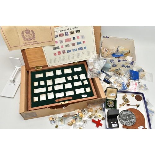 147 - A CASED SET OF SILVER STAMPS AND A BOX OF PIN BADGES, 'The Stamps of Royalty' silver stamp collectio... 