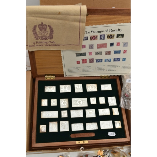 147 - A CASED SET OF SILVER STAMPS AND A BOX OF PIN BADGES, 'The Stamps of Royalty' silver stamp collectio... 