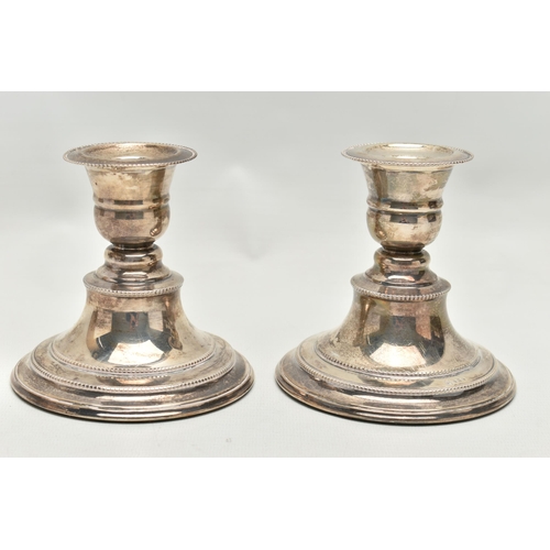 225 - A PAIR OF ELIZABETH II SILVER DWARF CANDLESTICKS OF CIRCULAR FORM, beaded rims, detachable sconces, ... 