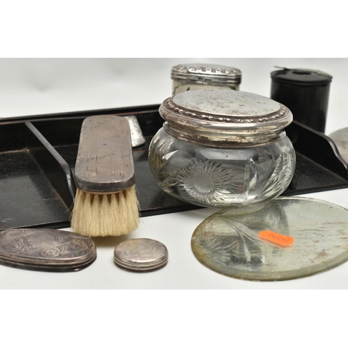 250 - A BOX OF SILVER BACKED AND SILVER MOUNTED DRESSING TABLE ITEMS, including a well used four piece Geo... 