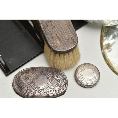 250 - A BOX OF SILVER BACKED AND SILVER MOUNTED DRESSING TABLE ITEMS, including a well used four piece Geo... 