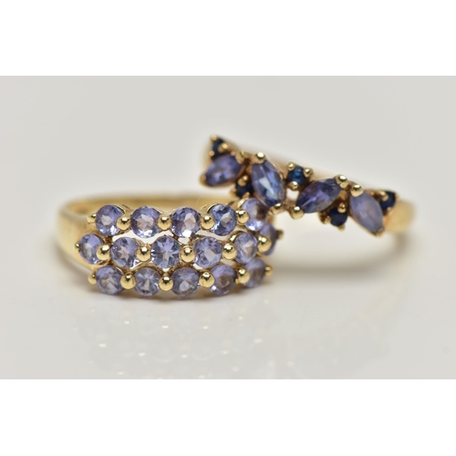 28 - TWO 9CT GOLD TANZANITE RINGS, the first designed with a row of three circular cut tanzanite, sixteen... 