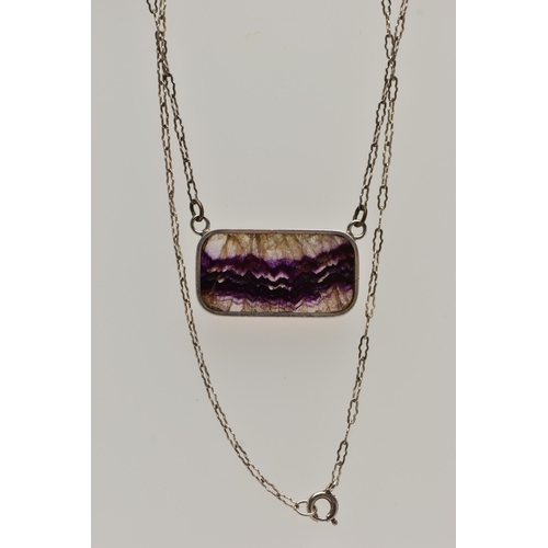 48 - A SILVER BLUE JOHN FLUORITE PENDANT, the blue john fluorite pendant of a rectangular form collet set... 