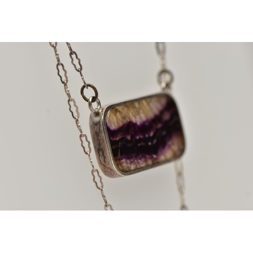 48 - A SILVER BLUE JOHN FLUORITE PENDANT, the blue john fluorite pendant of a rectangular form collet set... 