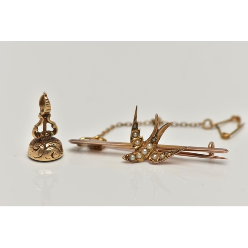 49 - A YELLOW METAL SWALLOW BROOCH AND A SMALL FOB SEAL PENDANT, swallow bird set with split pearls, to a... 