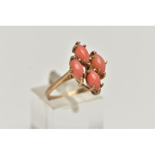 53 - A 9CT GOLD CORAL RING, four marquise cabochon coral stones set as a cluster in a yellow gold mount, ... 