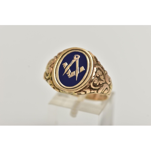 57 - A HEAVY 9CT GOLD MASONIC ENAMEL RING, of an oval form decorated with blue enamel, scrolling embossed... 