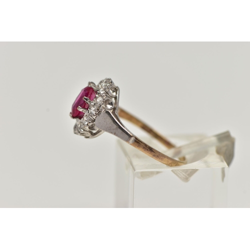 58 - A 9CT GOLD CLUSTER RING, of an oval form, centring on an oval cut synthetic ruby, in a surround of c... 